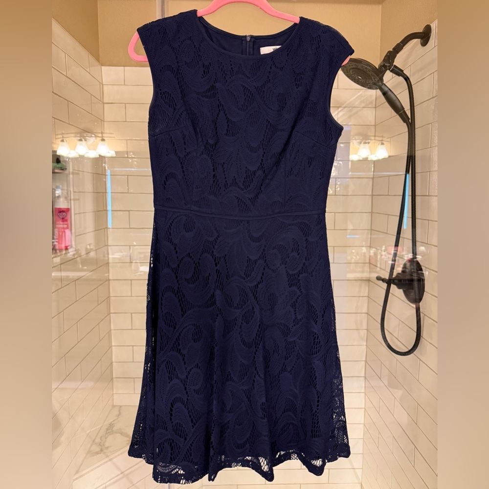 Navy blue lace dress. Above knee.
